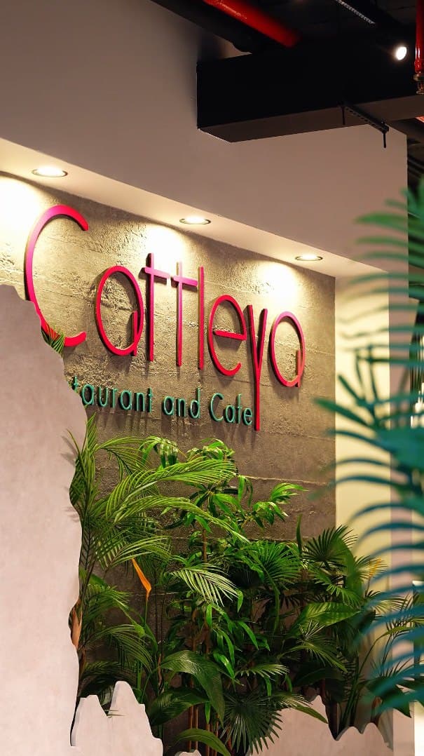 Cattleya restaurant entrance with the illuminated logo
